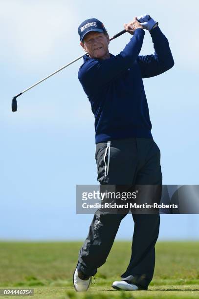 Tom Watson of the United States tees off on the 10th hole during the final round of the Senior Open Championship presented by Rolex at Royal...