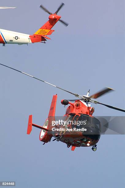 United States Coast Guard helicopters participate May 6, 2001 on day two of the two-day Air & Sea Show's salute to the U.S. Military in Ft....