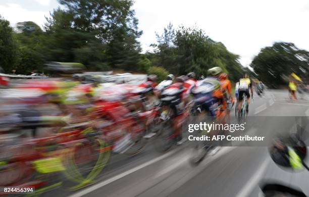 Riders head out into Surrey during the "Prudential RideLondon-Surrey Classic 2017", UCI World Tour cycle race in London on July 30, 2017. / AFP PHOTO...