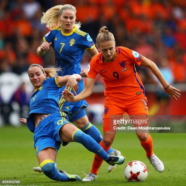 Vivianne Miedema of the Netherlands is challenged by Kosovare Asllani of Sweden during the UEFA Women's Euro 2017 Quarter Final match between...