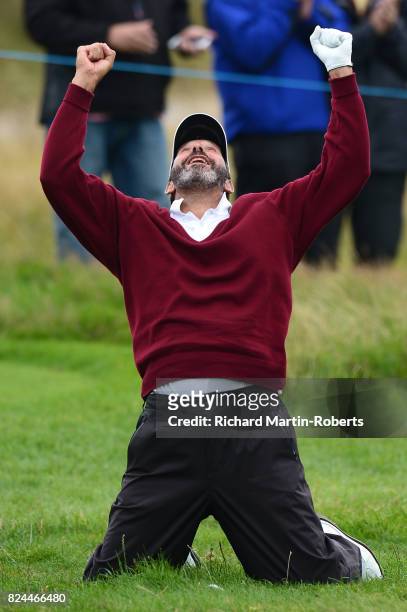 Santiago Luna of Spain celebrates chipping in on the 18th green during the final round of the Senior Open Championship presented by Rolex at Royal...