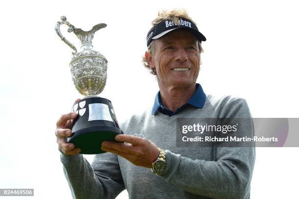 Bernhard Langer of Germany holds the Senior Claret Jug following his victory during the final round of the Senior Open Championship presented by...