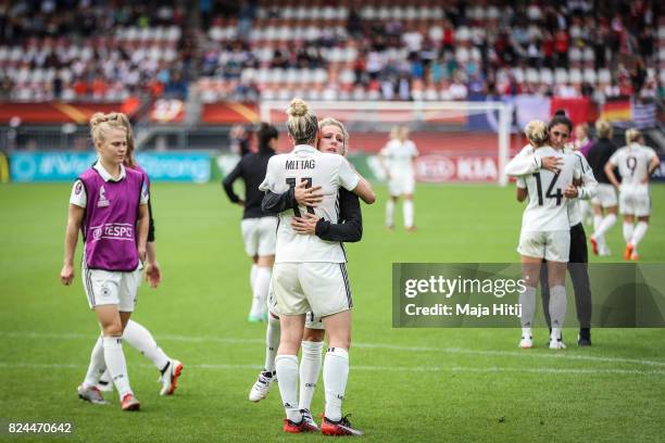 Anja Mittag and Svenja Huth of Germany react after the UEFA Women's Euro 2017 Quarter Final match between Germany and Denmark at Sparta Stadion on...
