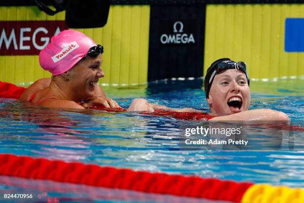 Lilly King of the United States celebrates victory and a new World Record of 29.40 in the Women's 50m Breastsroke Final on day seventeen of the...