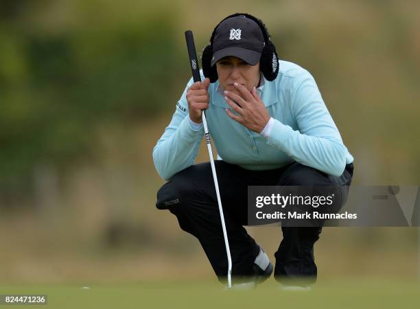 Cristie Kerr of USA lines up a putt at the 12th hole during the final day of the Aberdeen Asset Management Ladies Scottish Open at Dundonald Links...