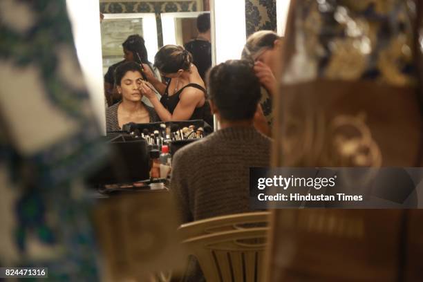 Models get ready backstage during the day 4 of India Couture Week 2017, organised by Fashion Design Council of India, with Hindustan Times as its...