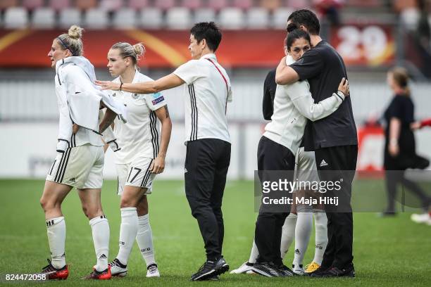 Anja Mittag , Isabel Kerschowski and Sara Doorsoun of Germany react after the UEFA Women's Euro 2017 Quarter Final match between Germany and Denmark...