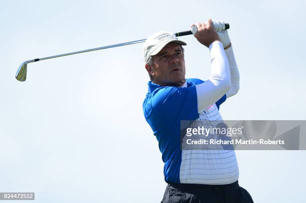 Scott Dunlap of the United States tees off on the 10th hole during the final round of the Senior Open Championship presented by Rolex at Royal...