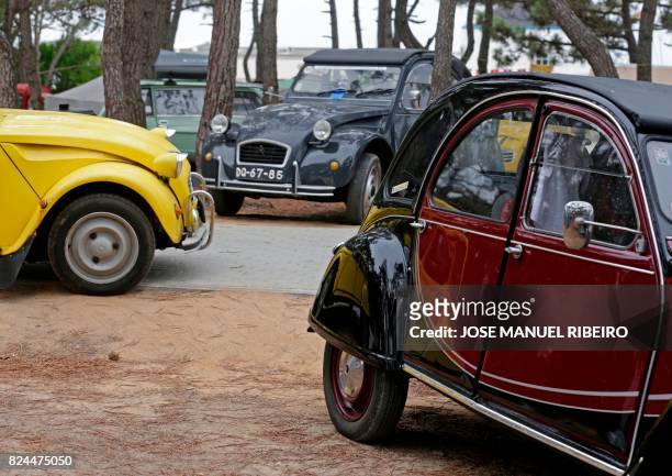 Cars are are parked at a camping site in Ericeira during the World 2017 2CV Meeting July 30, 2017. - The event is held between the 26th and the 31st...