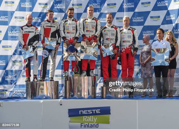 Jyvaskyla , Finland - 30 July 2017; The winning team, Esapekka Lappi and Janne Ferm of Finland, centre, along with second place team of Elfyn Evans...