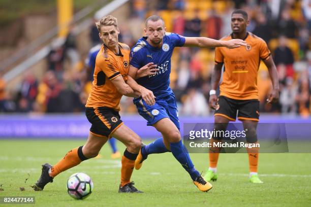 David Edwards of Wolves battles Danny Drinkwater of Leicester during the pre-season friendly match between Wolverhampton Wanderers and Leicester City...