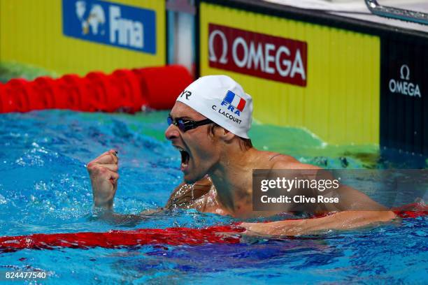 Camille Lacourt of France celebrates victory in the Men's 50m Backstroke Final on day seventeen of the Budapest 2017 FINA World Championships on July...