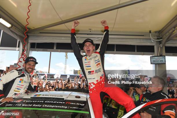 Jyvaskyla , Finland - 30 July 2017; Esapekka Lappi, centre, of Finland and Janne Ferm, left of Finland celebrate after winning Rally Finland in their...