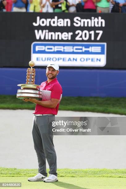 Jordan Smith of England celebrate with the trophy after the final round during the Green Eagle Golf Course on July 30, 2017 in Hamburg, Germany.