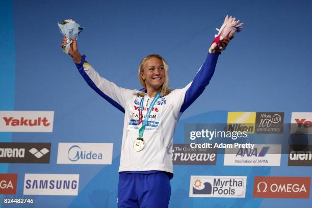 Sarah Sjostrom of Sweden celebrates victory in the Women's 50m Freestyle Final on day seventeen of the Budapest 2017 FINA World Championships on July...