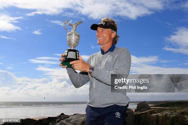 Bernhard Langer of Germany poses with the Senior Claret Jug after the final round of the Senior Open Championship at Royal Porthcawl Golf Club on...