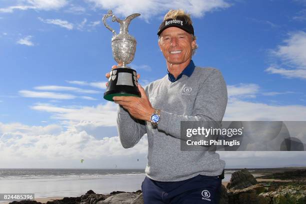 Bernhard Langer of Germany poses with the Senior Claret Jug after the final round of the Senior Open Championship at Royal Porthcawl Golf Club on...