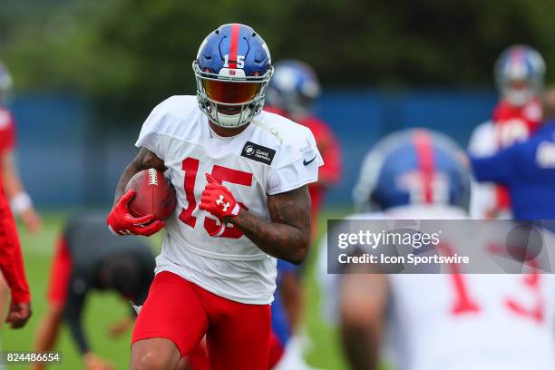 New York Giants wide receiver Brandon Marshall runs at teammate New York Giants wide receiver Odell Beckham during 2017 New York Giants training camp...