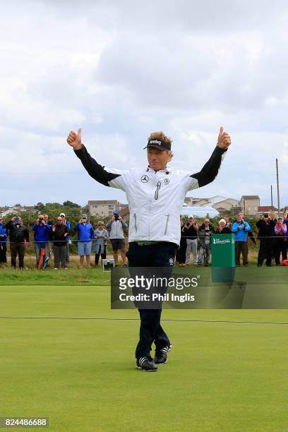 Bernhard Langer of Germany salutes the crowds applause after the final round of the Senior Open Championship at Royal Porthcawl Golf Club on July 30,...