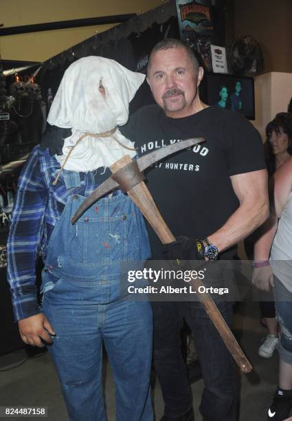 Actor Kane Hodder poses with Jason Voorhees at Day 1 of Midsummer Scream Halloween Festival held at Long Beach Convention Center on July 29, 2017 in...
