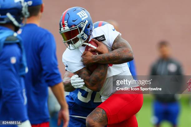 New York Giants wide receiver Brandon Marshall runs after he catches a pass during 2017 New York Giants training camp on July 29 at Quest Diagnostics...