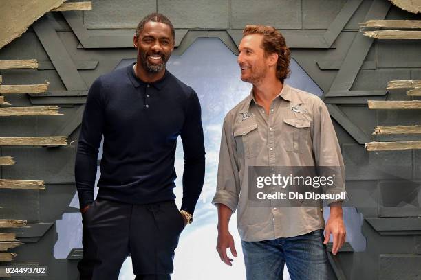 Idris Elba and Matthew McConaughey attend "The Dark Tower" photocall at the Whitby Hotel on July 30, 2017 in New York City.