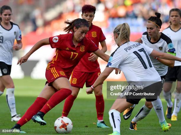 Sarah Puntigam of Austria vies with Olga Garcia of Spain during the UEFA Women's Euro 2017 quarter-final football match between Austria and Spain at...