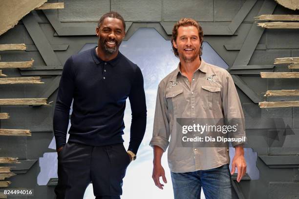 Idris Elba and Matthew McConaughey attend "The Dark Tower" photocall at the Whitby Hotel on July 30, 2017 in New York City.