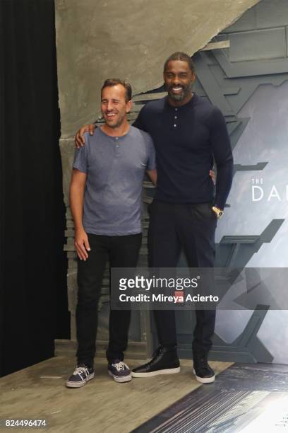Filmmaker Nikolaj Arcel and actor Idris Elba attend "The Dark Tower" photo call at the Whitby Hotel on July 30, 2017 in New York City.