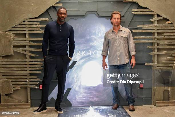 Idris Elba and Matthew McConaughey attend "The Dark Tower" photocall at the Whitby Hotel on July 30, 2017 in New York City.