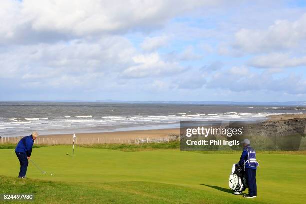 Colin Montgomerie of Scotland in action during the final round of the Senior Open Championship at Royal Porthcawl Golf Club on July 30, 2017 in...