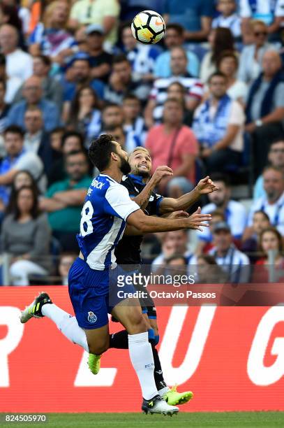 Felipe of FC Porto competes for the ball with Andone of RC Deportivo La Coruna during the Pre-Season Friendly match between FC Porto and RC Deportivo...