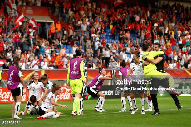 The of Austria team celebrate victory after the UEFA Women's Euro 2017 Quarter Final match between Austria and Spain at Koning Willem II Stadium on...