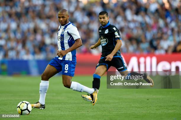 Brahimi of FC Porto competes for the ball with Juanfran of RC Deportivo La Coruna during the Pre-Season Friendly match between FC Porto and RC...