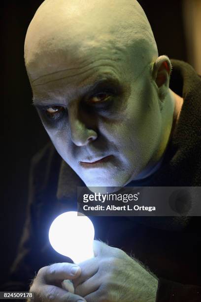 Cosplayer Noel Jason Scott as Uncle Fester attend Day 1 of Midsummer Scream Halloween Festival held at Long Beach Convention Center on July 29, 2017...