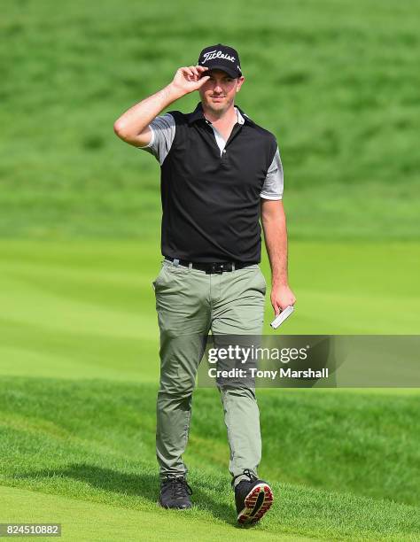 Ryan McCarthy of Australia walks on to the 18th green during the Porsche European Open - Day Four at Green Eagle Golf Course on July 30, 2017 in...