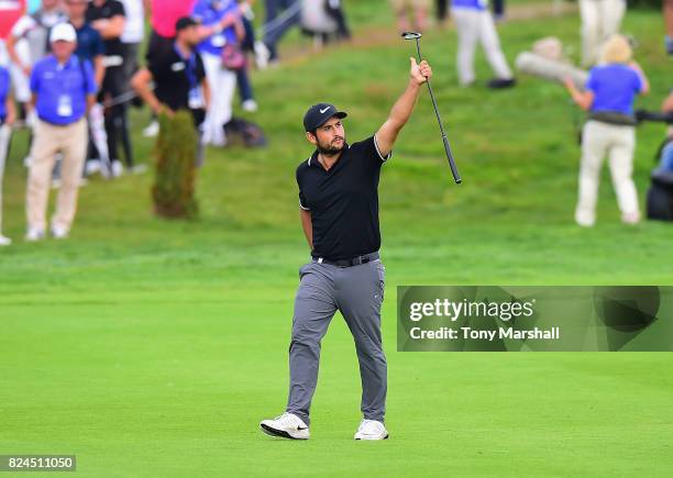 Alexander Levy of France walks on to the 18th green during the Porsche European Open - Day Four at Green Eagle Golf Course on July 30, 2017 in...