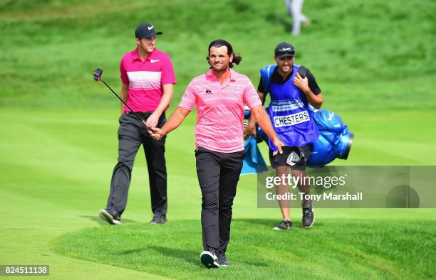 Johan Edfors of Sweden walks on to the 18th green during the Porsche European Open - Day Four at Green Eagle Golf Course on July 30, 2017 in Hamburg,...