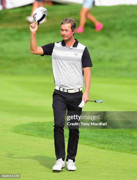 Jens Fahrbring of Sweden walks on to the 18th green during the Porsche European Open - Day Four at Green Eagle Golf Course on July 30, 2017 in...