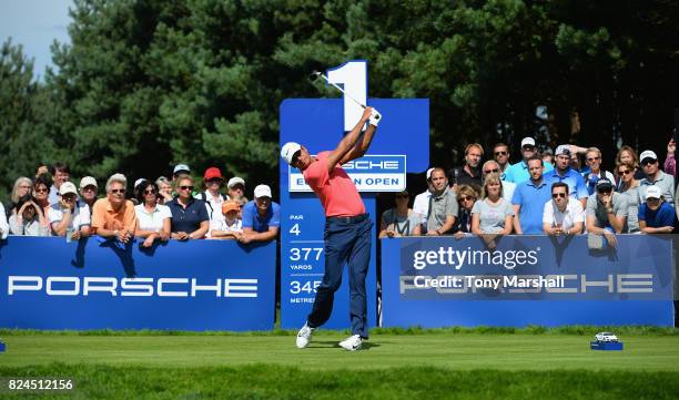 Julian Suri of the United States plays his first shot on the 1st tee during the Porsche European Open - Day Four at Green Eagle Golf Course on July...