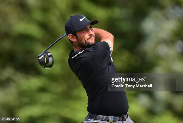 Alexander Levy of France plays his first shot on the 13th tee during the Porsche European Open - Day Four at Green Eagle Golf Course on July 30, 2017...