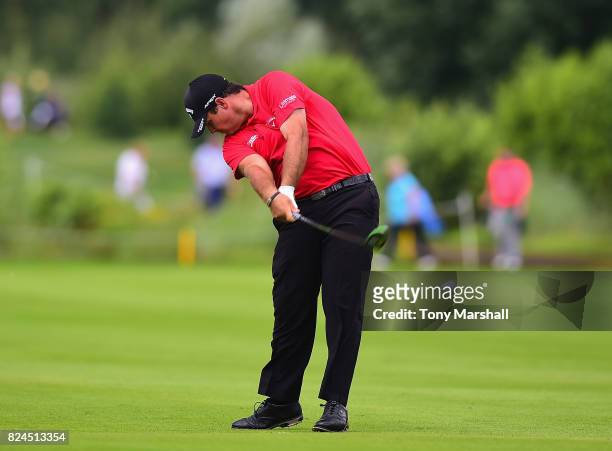 Patrick Reed of the United States plays his second shot on the 9th fairway during the Porsche European Open - Day Four at Green Eagle Golf Course on...