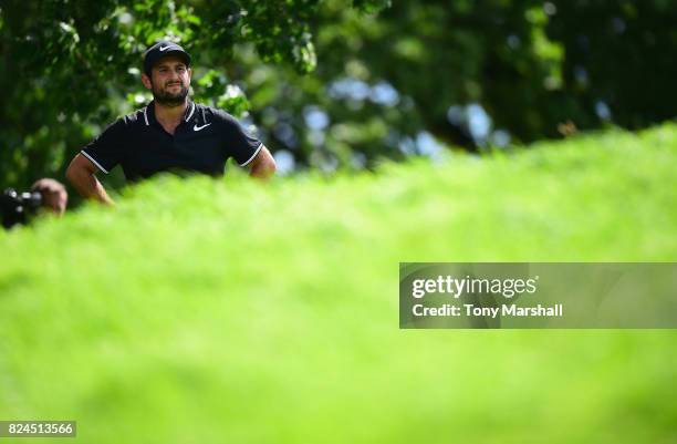 Alexander Levy of France looks for the line of his second shot on the 10th fairway during the Porsche European Open - Day Four at Green Eagle Golf...