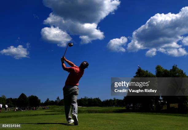 Charley Hoffman of the United States plays his shot from the eighth tee during the final round of the RBC Canadian Open at Glen Abbey Golf Club on...