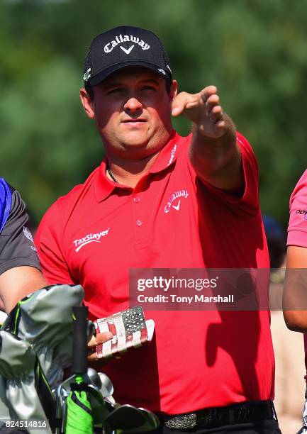 Patrick Reed of the United States looks at the line of his firt shot on the 1st tee during the Porsche European Open - Day Four at Green Eagle Golf...