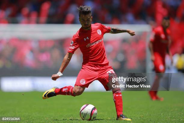 Rodrigo Gomez of Toluca kicks the ball during the 2nd round match between Toluca and Leon as part of the Torneo Apertura 2017 Liga MX at Nemesio Diez...