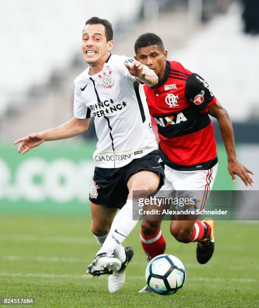 Rodriguinho of Corinthians and Marcio Araujo of Flamengo in action during the match between Corinthians and Flamengo for the Brasileirao Series A...