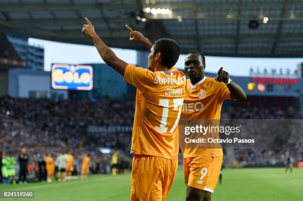 Corona of FC Porto celebrates with Aboubakar after scores the third goal during the Pre-Season Friendly match between FC Porto and RC Deportivo La...