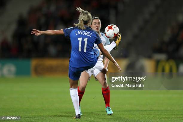 Claire Lavogez of France and Jade Moore of England battle for possession during the UEFA Women's Euro 2017 Quarter Final match between France and...