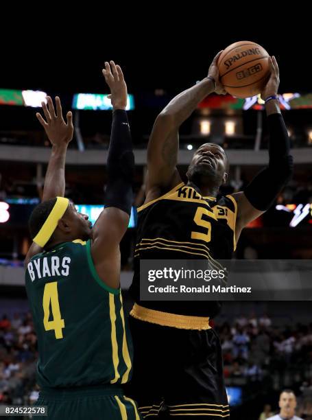 Stephen Jackson of the Killer 3s attempts a shot while being guarded by Derrick Byars of the Ball Hogs during week six of the BIG3 three on three...